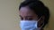 An Indian woman shows double masking during covid-19 pandemic, healthcare concept