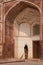 Indian woman sweeping floor of Humayun\'s Tomb, Delhi, India