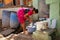 Indian woman washing clothes on the street