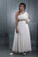 Indian woman in white prom dress