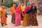 Indian women in colorful saris walking up the stairs at Ranthambore Fort, India