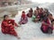 Indian women sing on the banks of the Yamuna river