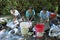 Indian women wash laundry in flowing stream