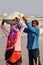 Indian workers putting basin with salt on head of woman on Sambhar Salt Lake. Rajasthan. India