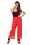 Indian you girl with red velvet camisole and loose pant with elegant pose and expression