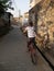 Indian young children boy cycling in village road whit t shirt