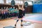 Indicative performance of weightlifters at the championship in cheerleading,young girl lifts a heavy barbell, barbell weight - 50