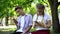 Indifferent teenagers scrolling smartphones in park, gadget addiction problem