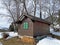 Indigenous alpine huts and wooden cattle stables on Swiss pastures covered with fresh white snow cover, Wildhaus - Obertoggenburg