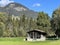 Indigenous alpine huts and wooden cattle stables in the valley of the river Albula or Alvra and in the area of the Alvaneu Bad