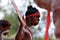 Indigenous Australians aboriginal men dancing a cultural ceremony dance
