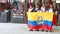 Indigenous dancers with a flag