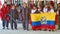 Indigenous dancers with a flag