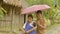 Indigenous family in the rain