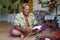 Indigenous Fijian man reads the bible in Fiji