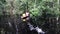 Indigenous kids in canoe in amazon river