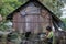 Indigenous Malaysian aboriginal craftman making a knife  for hunting