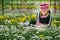 Indigenous people in northern Thailand and collection of chrysanthemums in the garden