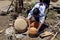 Indigenous woman making pottery