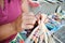 Indigenous Woman Weaving Coaster At Street Market Stall