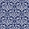 Indigo blue block print damask dyed texture background. Seamless woven japanese repeat batik pattern swatch. Wrinkled