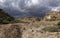 An indistinct footpath on the Valley floor of a small Valley formed by water eroded Volcanic Rocks