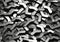 Indium Closeup Pile Wrenches Black Surface Surrealism Tessellati