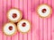 Individual Bakewell Tarts On A Pink Background