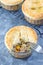 Individual beef pot pie or deep dish pie in ramekin, crust broken open to show the inside, vertical