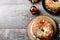 Individual Epiphany cake roscon de reyes with cream stuffed on wooden table