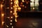 individual hanging fairy lights in a dimly lit room