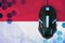 Indonesia flag and computer mouse. Concept of country representing e-sports team