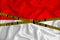 Indonesia flag, the Don`t Cross the Line mark and the location tape. Crime concept, police investigation, quarantine. 3d renderin