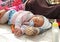 Indonesia, Jakarta. May 18, 2014. Woman with child begging