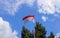 Indonesia and Monaco national flag with bluesky and greenery background
