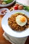 Indonesia Nasi Goreng fried rice with egg on white plate