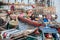 INDONESIA, TOGEAN ISLANDS -MALENGE - JULI 11, 2018: A family on traditional wooden boat by bajo village