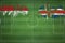 Indonesia vs Iceland Soccer Match, national colors, national flags, soccer field, football game, Copy space