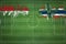 Indonesia vs Norway Soccer Match, national colors, national flags, soccer field, football game, Copy space