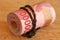 Indonesian banknotes rolled into a tube. IDR banknotes with a fa