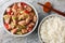 Indonesian Braised Pork Babi Kecap with Ginger, Chilli and Sweet soy sauce served with rice closeup. Horizontal top view