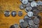 Indonesian coins on a wooden surface