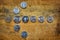 Indonesian coins on a wooden surface