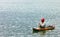 Indonesian fisherman fishing on a boat