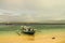 Indonesian fishermen on the sandy beach of the island of Gili Meno prepare the boat to sail to sea Indonesia