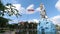 Indonesian flag and dewa ruci statue view from simpang siur cross road, bali, indonesia