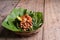 Indonesian green salad on wood table