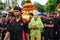 Indonesian with javanese traditional cloth on tumpeng agung umpak bale kambang carnival