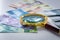 Indonesian money, Rupiah, Paper banknotes, Different values on which the magnifying glass lies