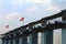 The Indonesian national flag flies over the floodgates